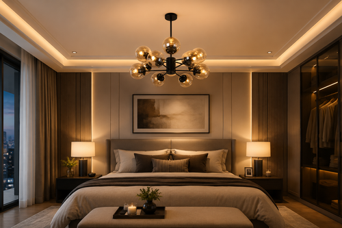 A modern bedroom interior with a bed centered against paneled walls, warm ambient lighting, a black chandelier with glowing glass globes, bedside tables and lamps, and a large window on the left.