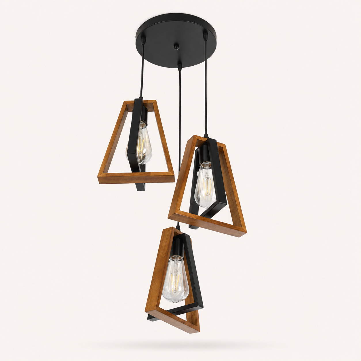 Three-light geometric pendant ceiling fixture with triangular wooden frames, black metal accents, and clear Edison-style bulbs, shown against a plain light background.