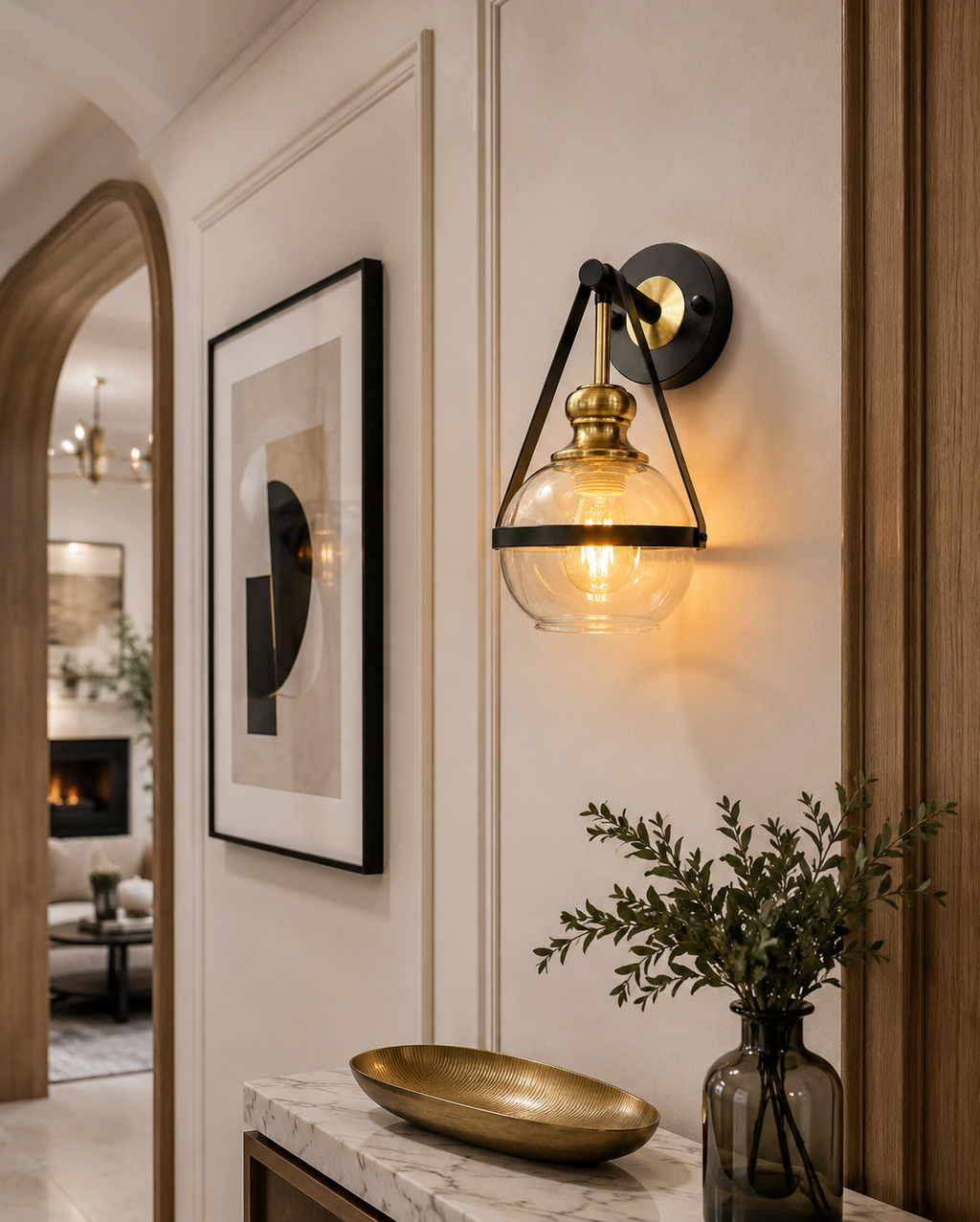 Modern industrial glass wall light installed in a luxury contemporary hallway, creating a warm ambient glow with elegant black and antique brass finishes.