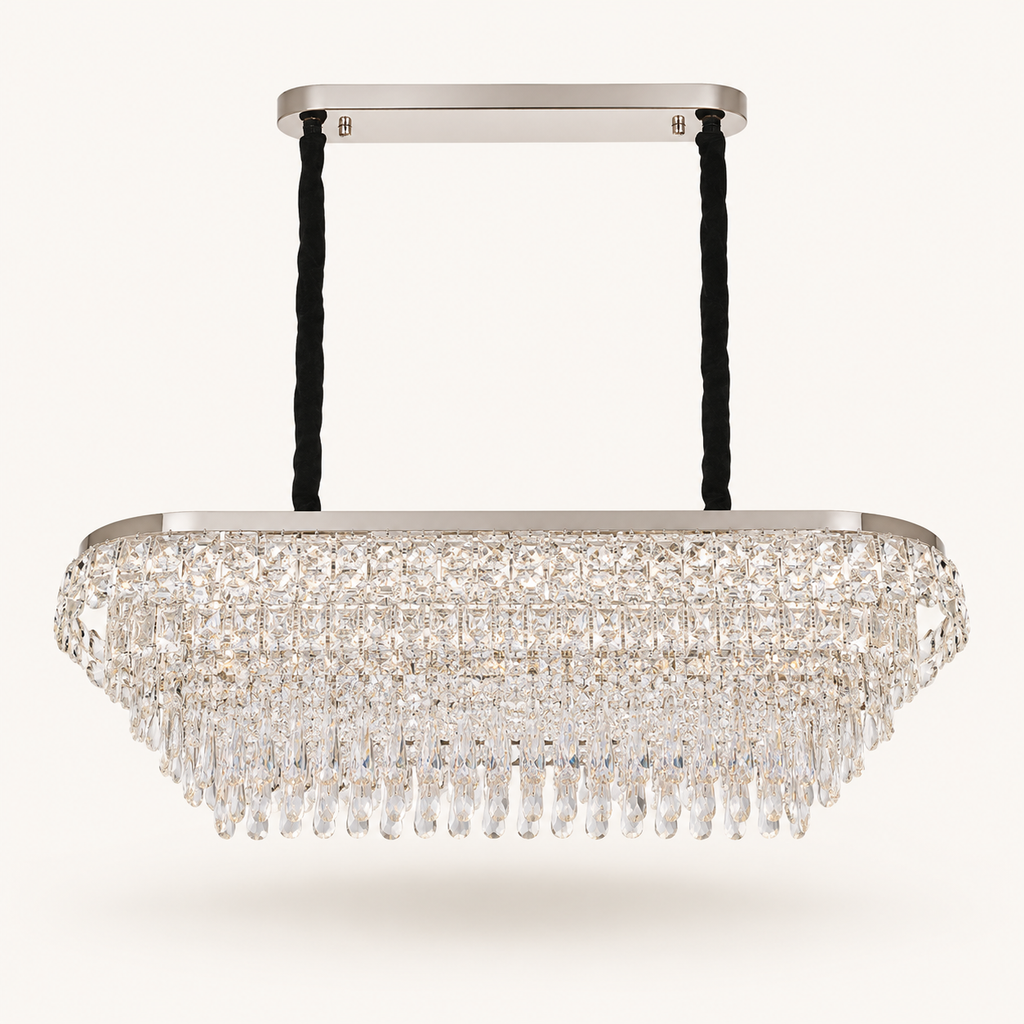 Luxury rectangular crystal chandelier with cascading crystal droplets and integrated LED lighting, suspended by black cables with a brushed gold frame, ideal for dining rooms, kitchen islands, and modern South African homes.
