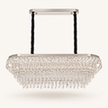 Luxury rectangular crystal chandelier with cascading crystal droplets and integrated LED lighting, suspended by black cables with a brushed gold frame, ideal for dining rooms, kitchen islands, and modern South African homes.