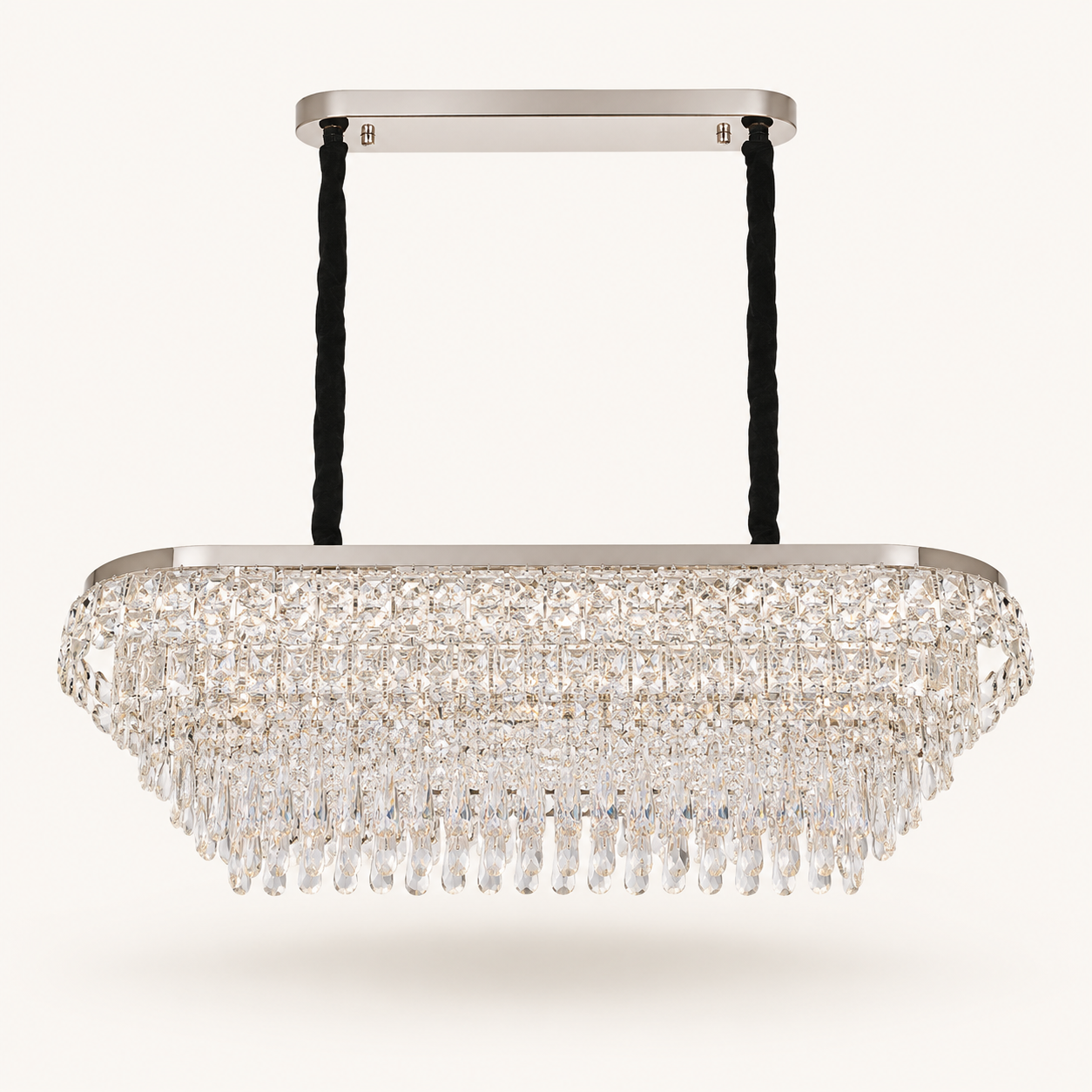 Luxury rectangular crystal chandelier with cascading crystal droplets and integrated LED lighting, suspended by black cables with a brushed gold frame, ideal for dining rooms, kitchen islands, and modern South African homes.