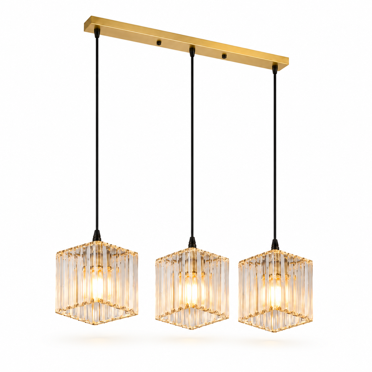 Three-light linear pendant chandelier with a brushed gold horizontal bar, black hanging cords, and clear faceted crystal cube shades glowing with warm light, shown on a white background.